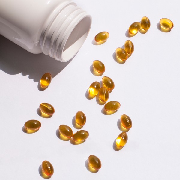 vitamins in the form of tablets are in the sun on the table