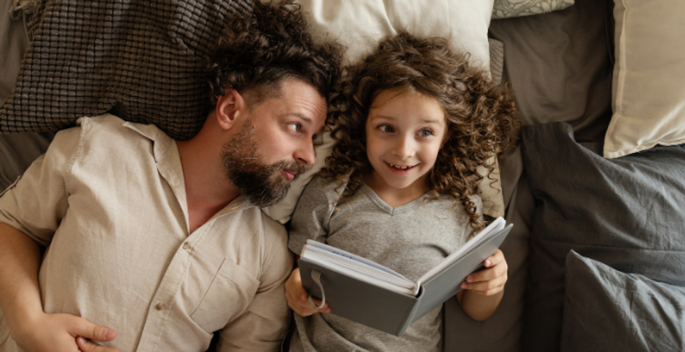 dad, dad and daughter, story time, parent in bed, happy girl, bonding