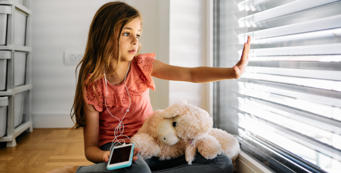 young girl alone, girl with smartphone, girl window, girl stuffed animal, boredom