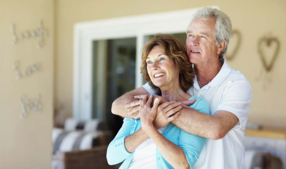 couple, middle-aged coupe, couple remembering, coule holding eachother, memories, good memories,