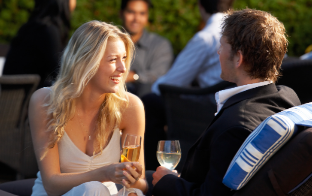 communication tips, elicitation, couple talking at party, wine, man and woman, 