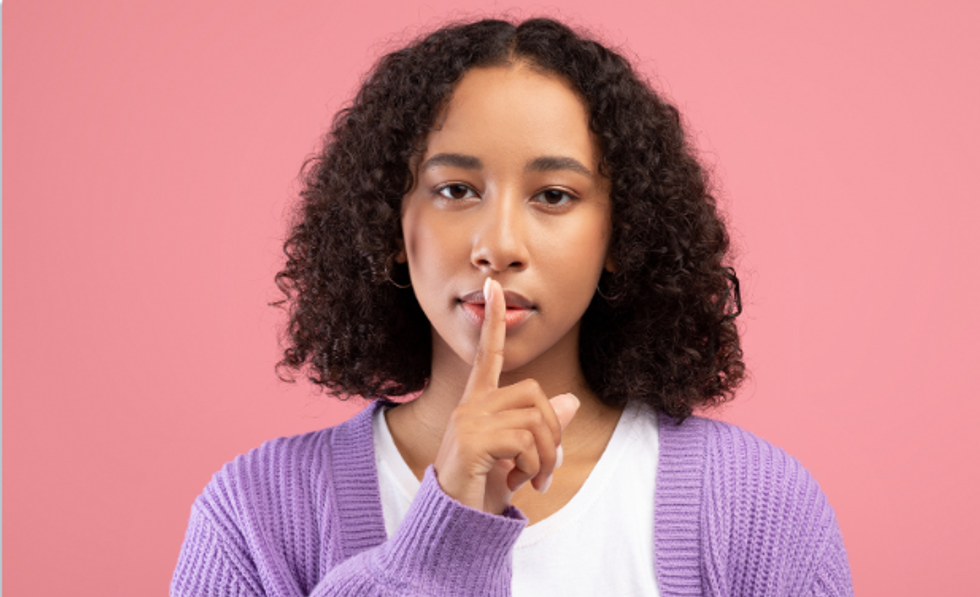 shhh, shush, finger over mouth, girl saying quiet, end of conversation, finger over mouth