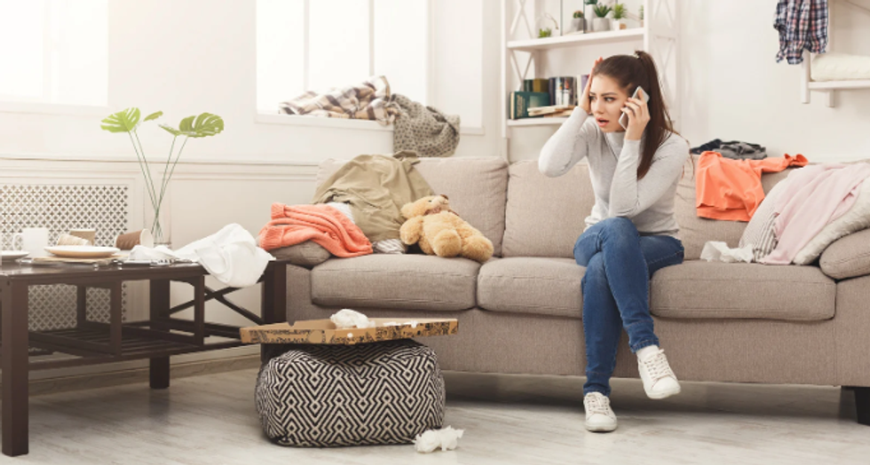 woman, phone, shock, mess, messy room, cleanliness,