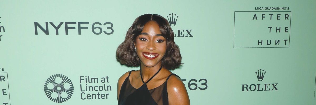 Ayo Edebiri, wearing a Chanel dress