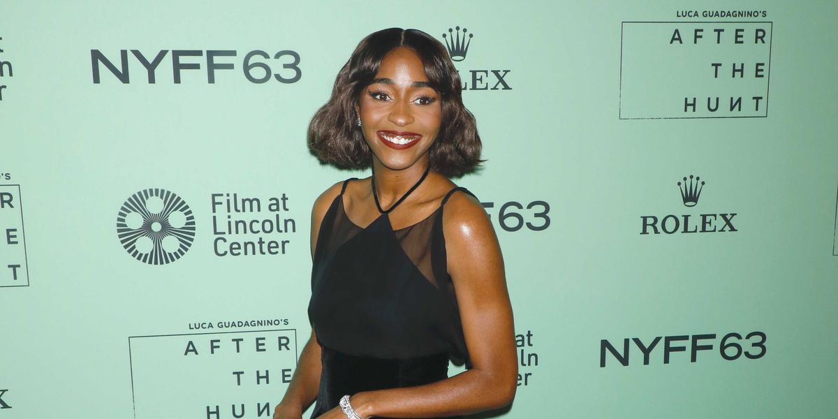 Ayo Edebiri, wearing a Chanel dress