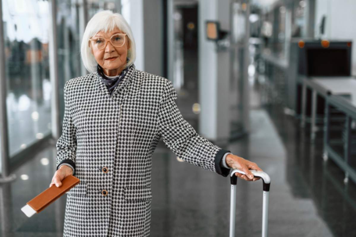 baby boomers, grandparents, travel, airport, senior woman traveling, luggage