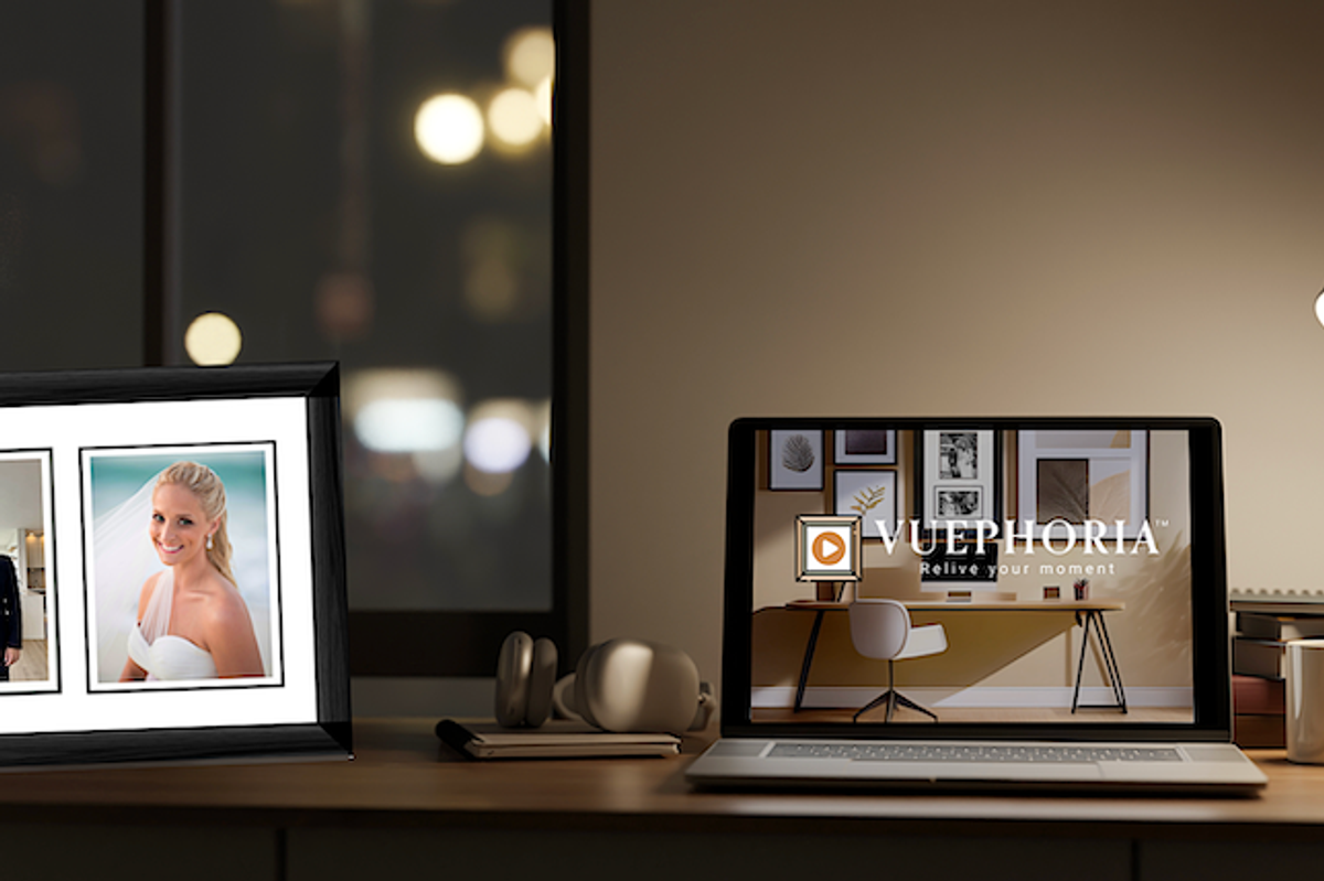 Photo of Vuephoria vFrame on a desk next to a laptop