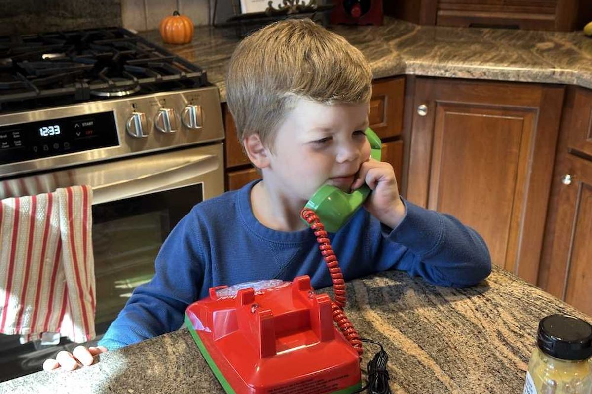 a child speaking with Santa on Santa's Magical Telephone