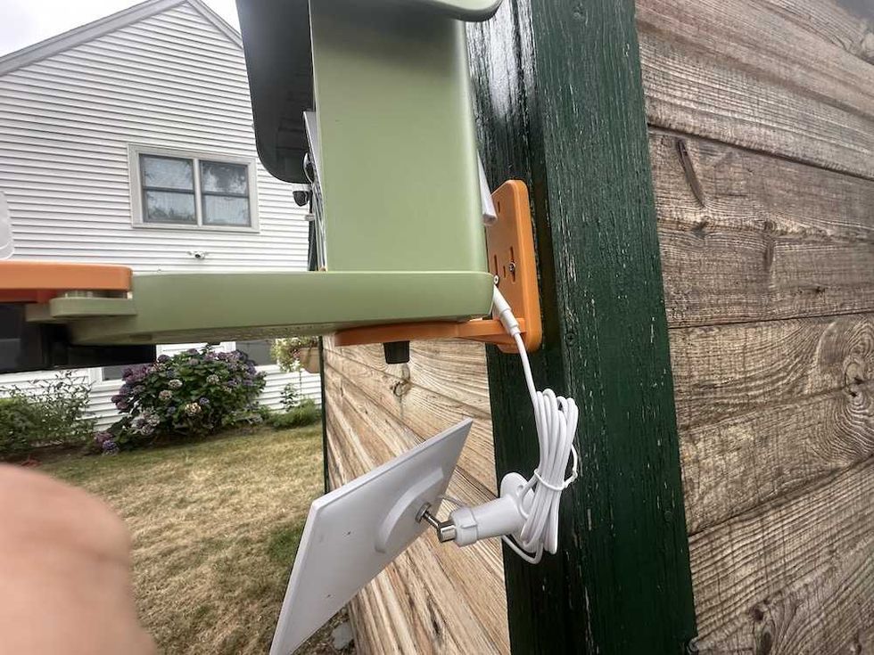 photo of Vinguys Smart Bird Feeder on a shed side view