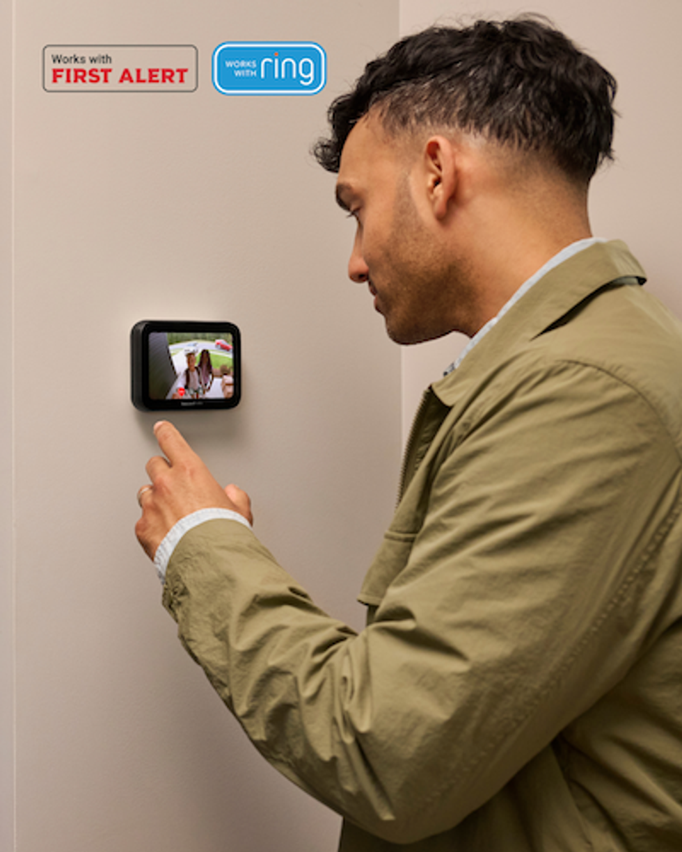Photo of a man live streaming video from. his video doorbell to Honeywell Home X8S smart thermostat