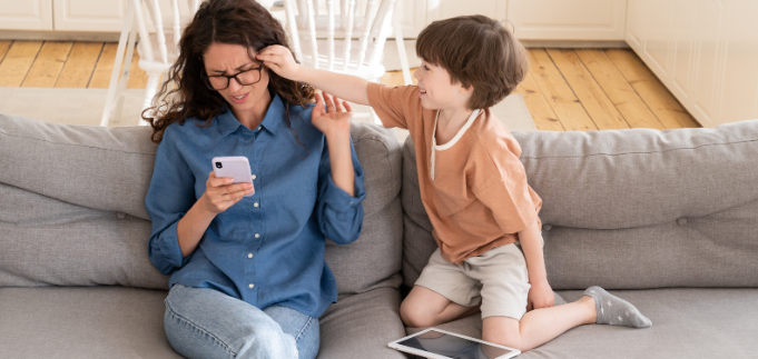 frustrated mom, child behavior, problem child, mom and phone, pulling hair