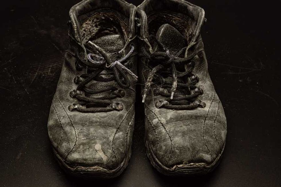 work shoes, tattered shoes, worn shoes, compassion, kind boss