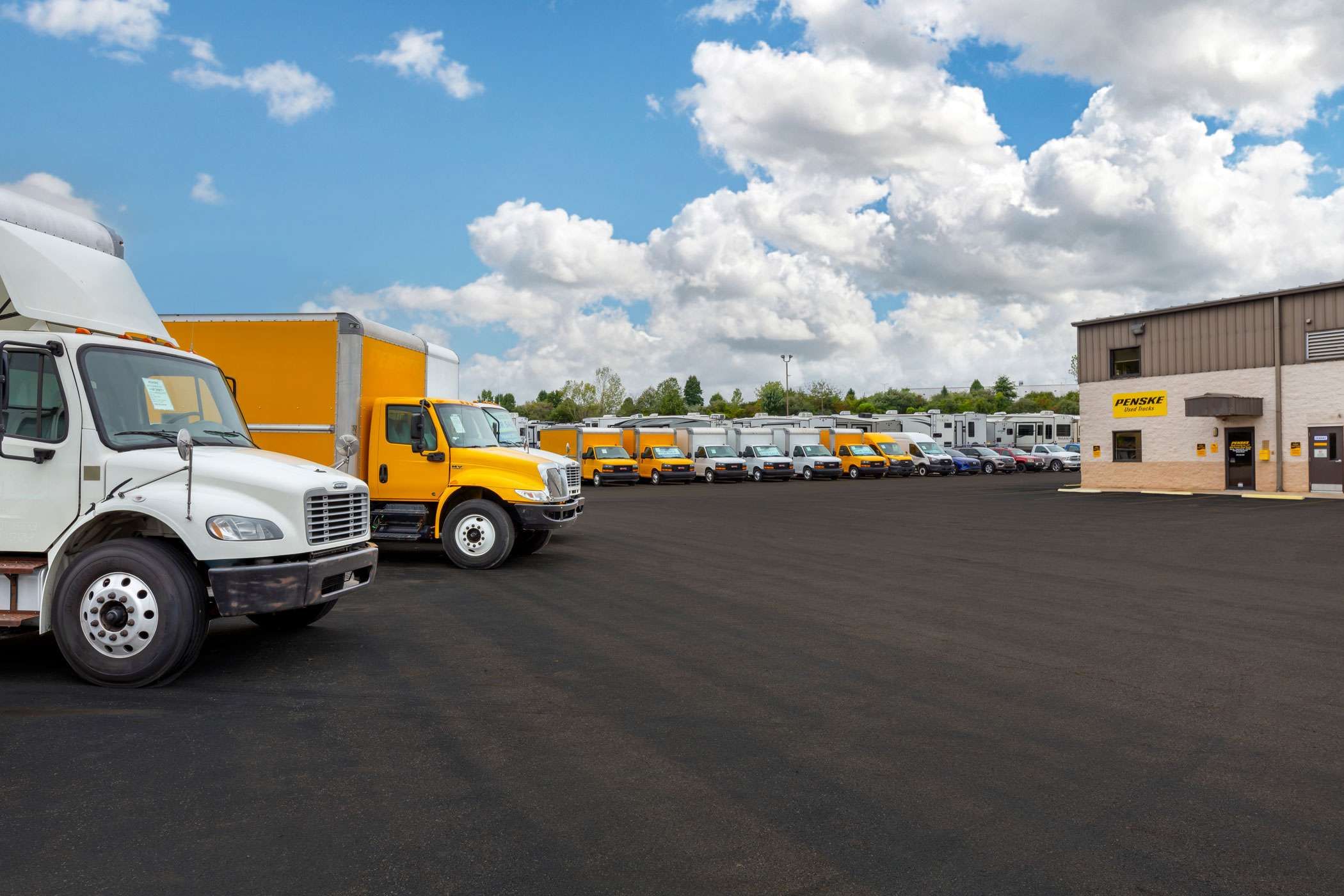 Penske box trucks in a lot