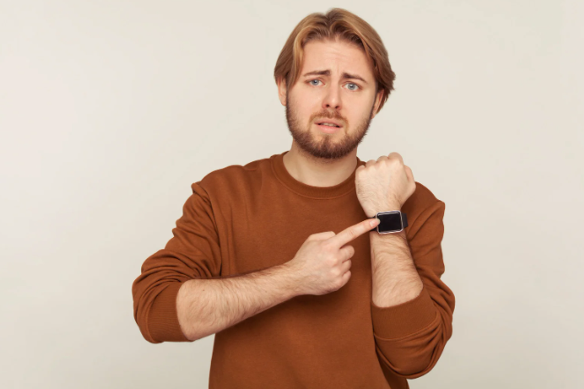 late, annoyed dad, man touching watch, time, courtesy, stressed man