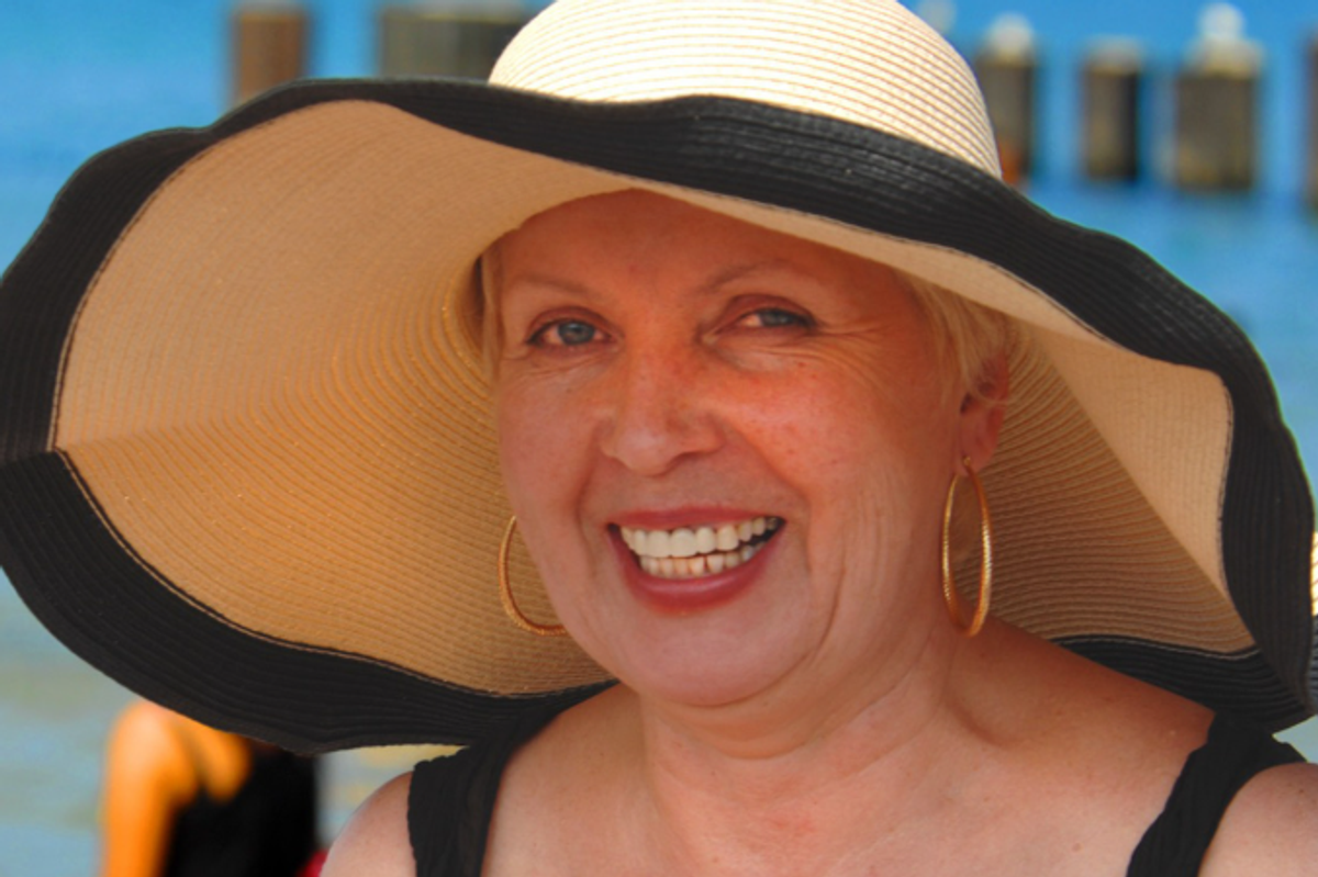 baby boomer, boomer grandma, boomer on vacation, sun hat, beach vacation
