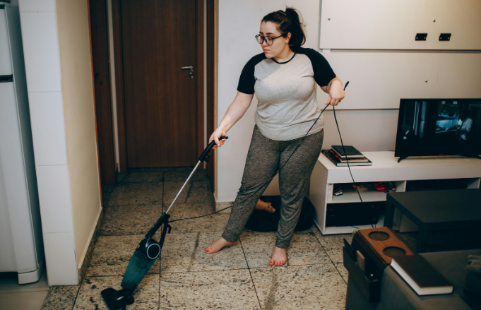 vacuum, chores, late-night chores, cleaning house, living room, TV
