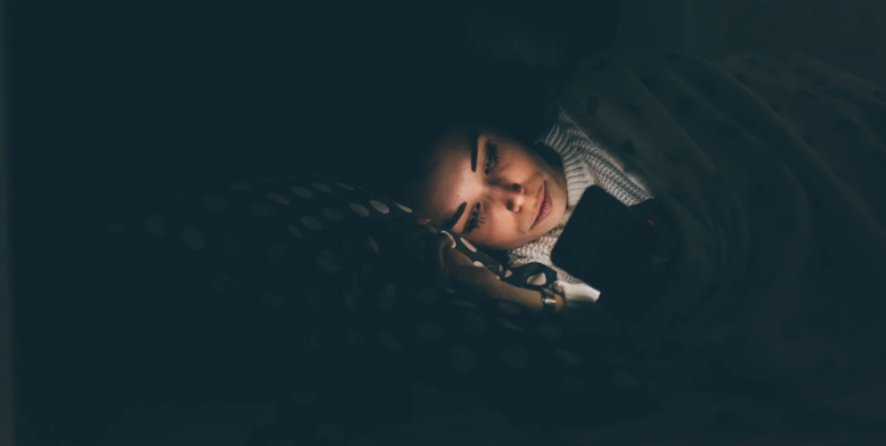 sleep, night, phone in bed, doomscroll, woman in bed, smartphone