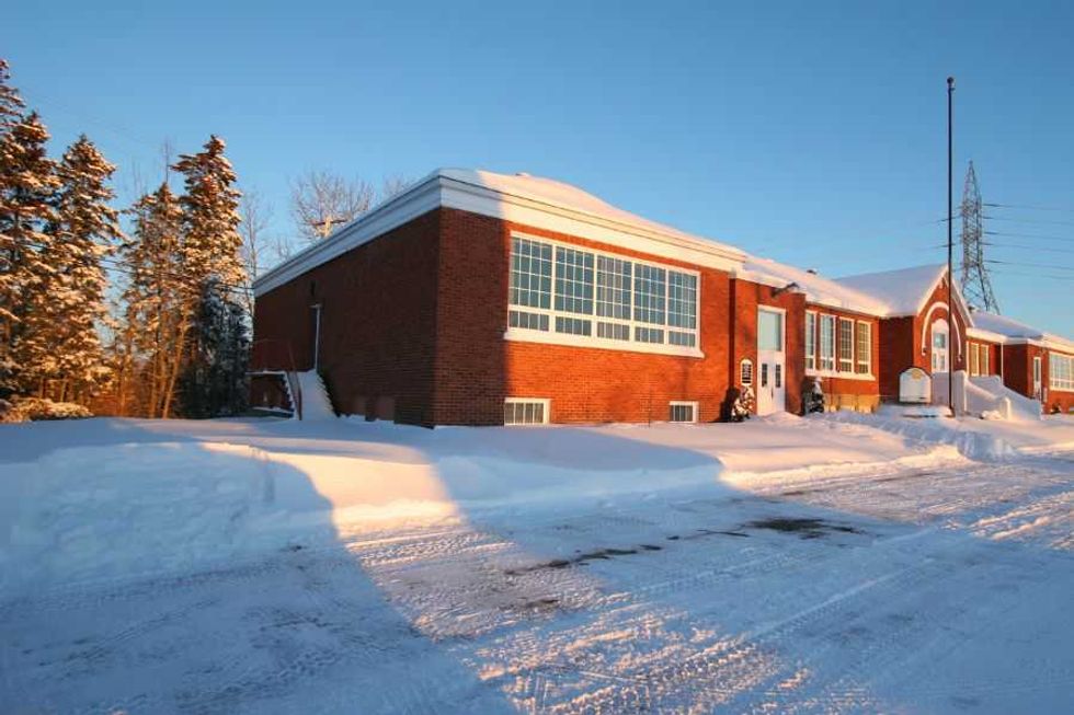 Detroit man; lost girl; Detroit; snow; school; walks child to school; CPS