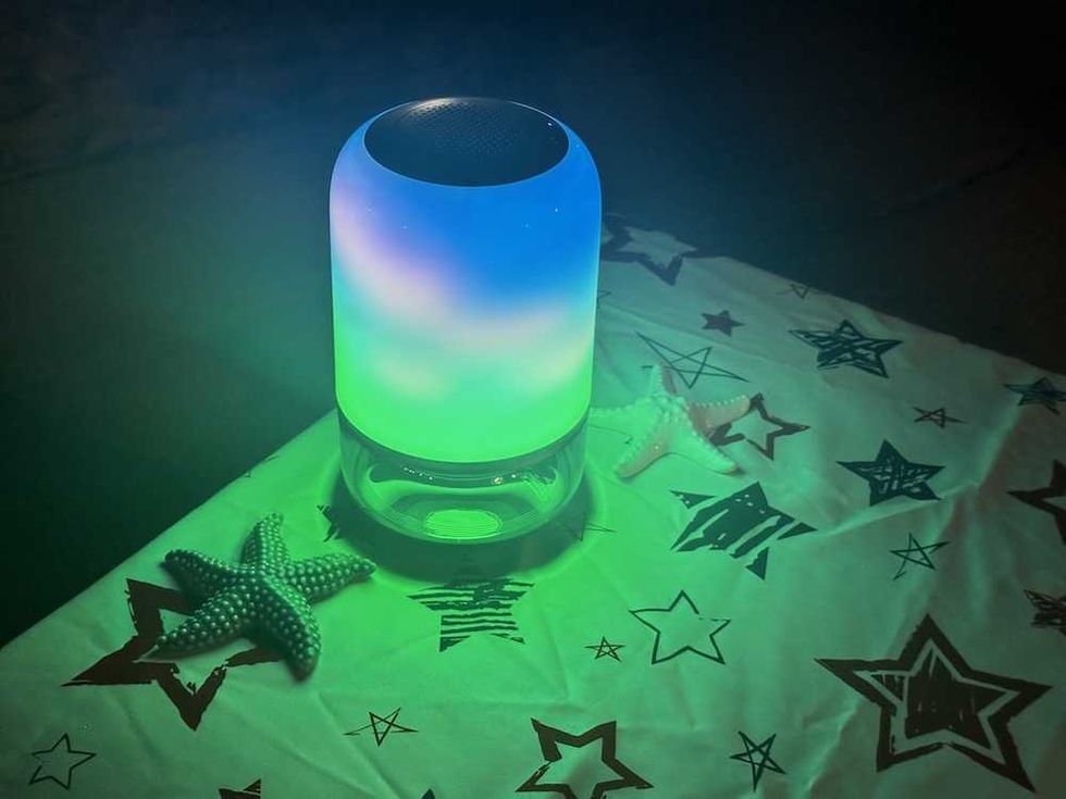 a photo of Govee Table Lamp 2 Pro at night showing fire lighting,.