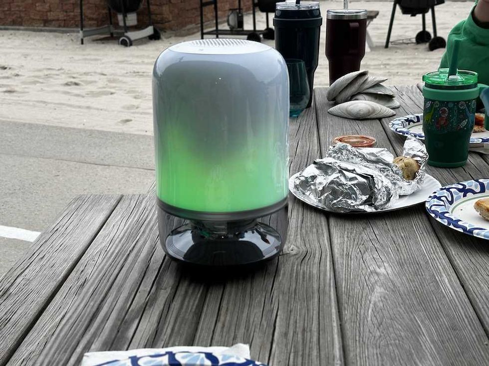 a photo of Govee Table Lamp 2 Pro on a picnic table at the beach