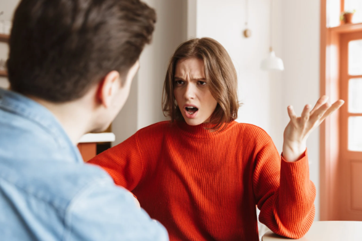 couple fight, argument, upset woman, woman in sweatshirt, marriage