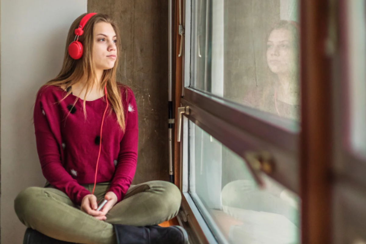 moody teen, teenager, girl wearing headphones, teen and window, iPod