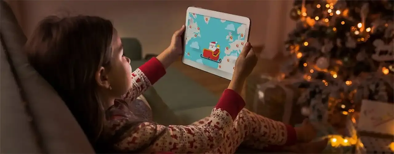 a photo of a child tracking santa on a tablet