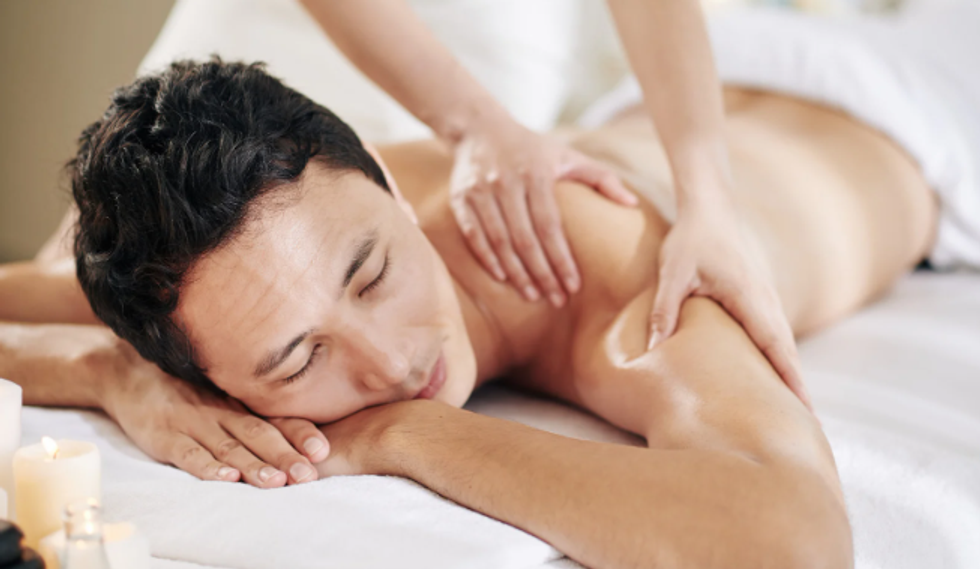 massage, self care, man having massage, relaxed man, massage table,