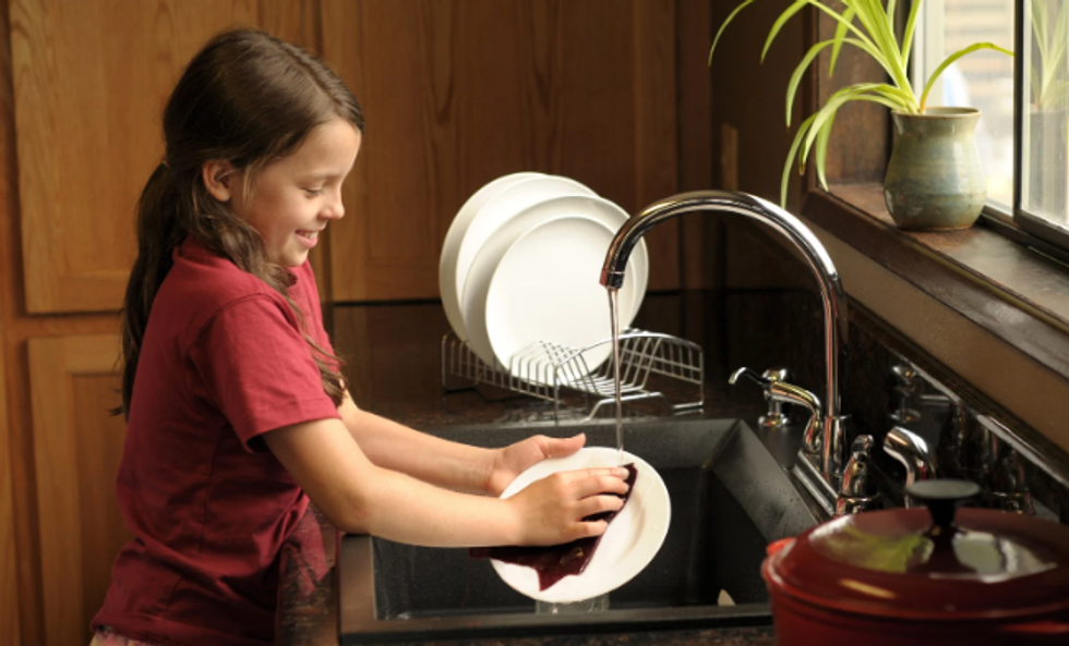 child doing dishes, girl doing dishes, child in kitchen, child doing chores