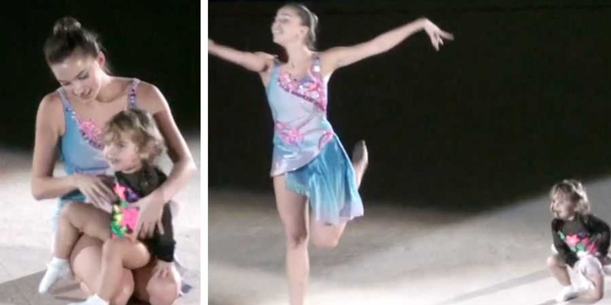 15 years ago, a Russian gymnast was interrupted by her 2-year-old daughter. It became a historic performance.