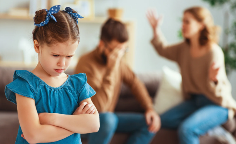 uset child, sad child, tottler, arguing parents, sad little girl