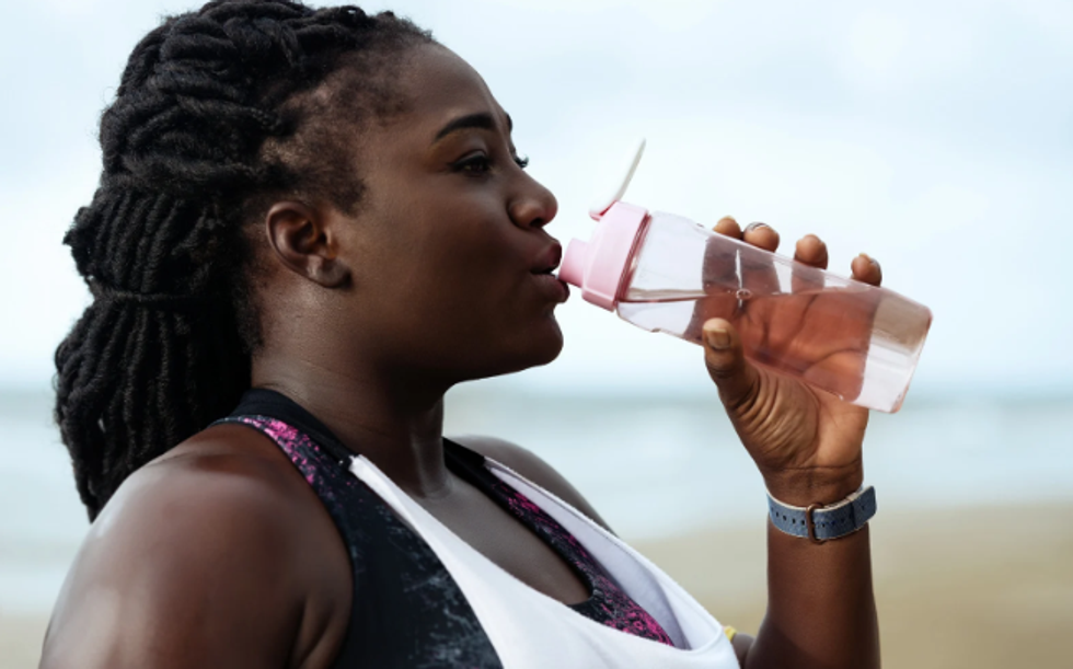 water bottle, plastic, thirsday woman, woman workout, workout clothes,