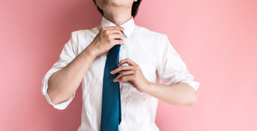 tie, putting on a tie, tying a tie, pink shirt, dress up