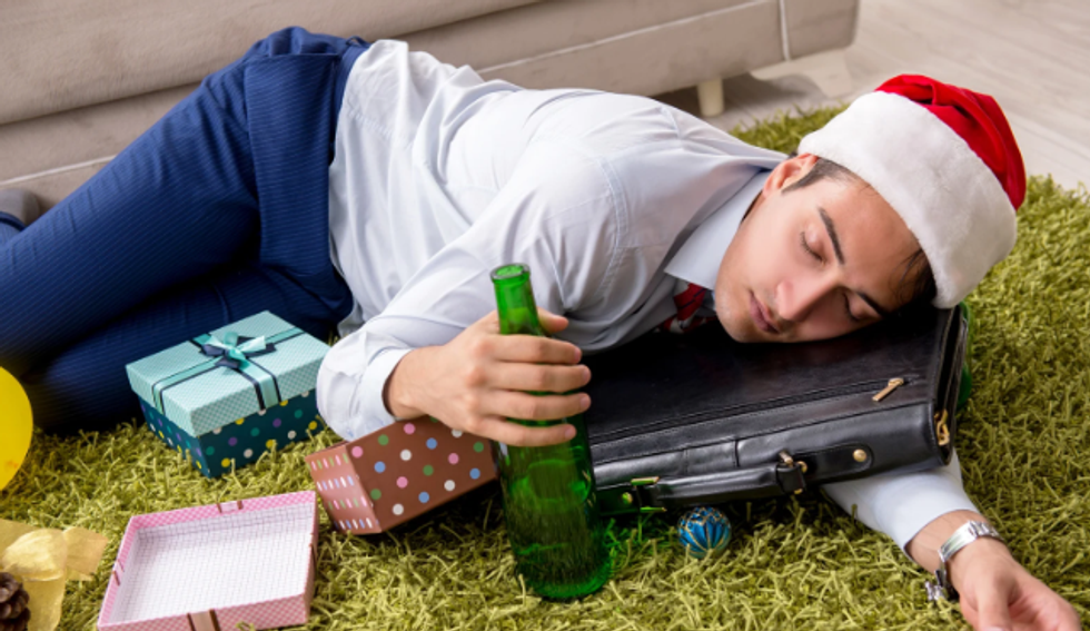 drunk guy, intoxicated guy, santa hat, brief case,beer