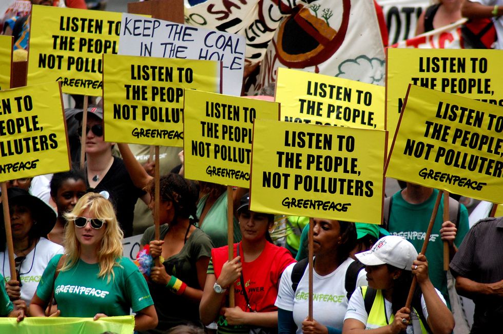 Hundreds Protest Inside U.N. Climate Talks