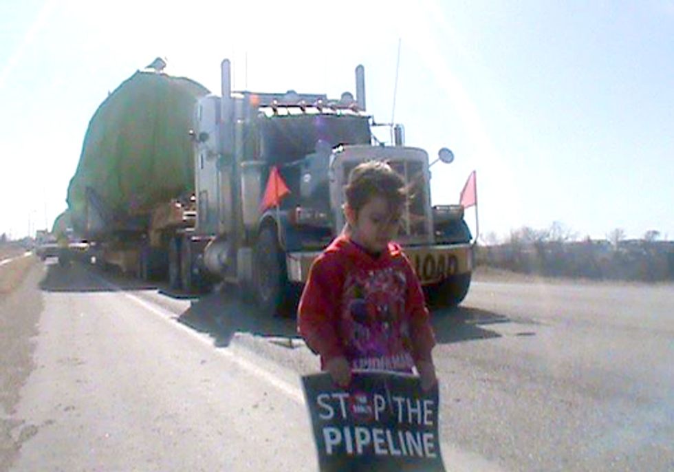 Lakota Draw a Line on the Land to Block Keystone Pipeline Trucks