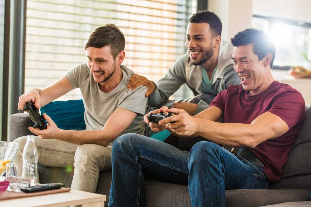 friends playing video game photo