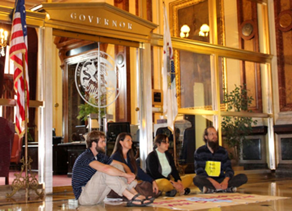 After One Arrest, Sit In Continues Demanding Moratorium on Fracking