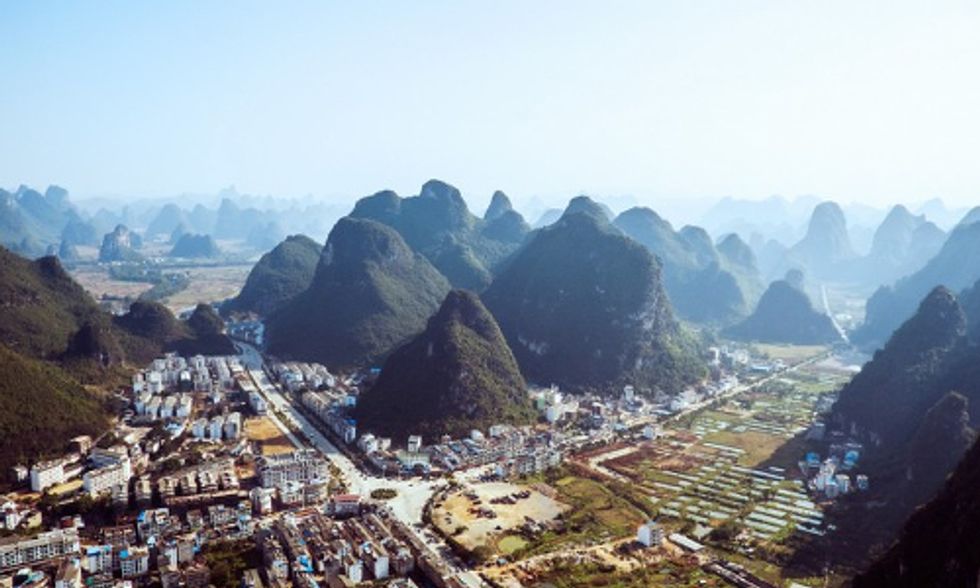 China Bulldozes Mountains to Expand Cities
