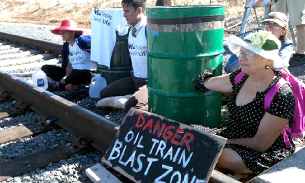 3 Arrested Blockading Train Tracks Protesting Oil-By-Rail