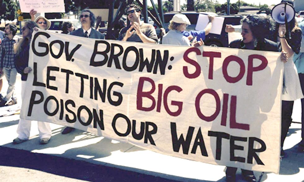 Californians Wearing Hazmat Suits Protest at Oil Industry Workshop
