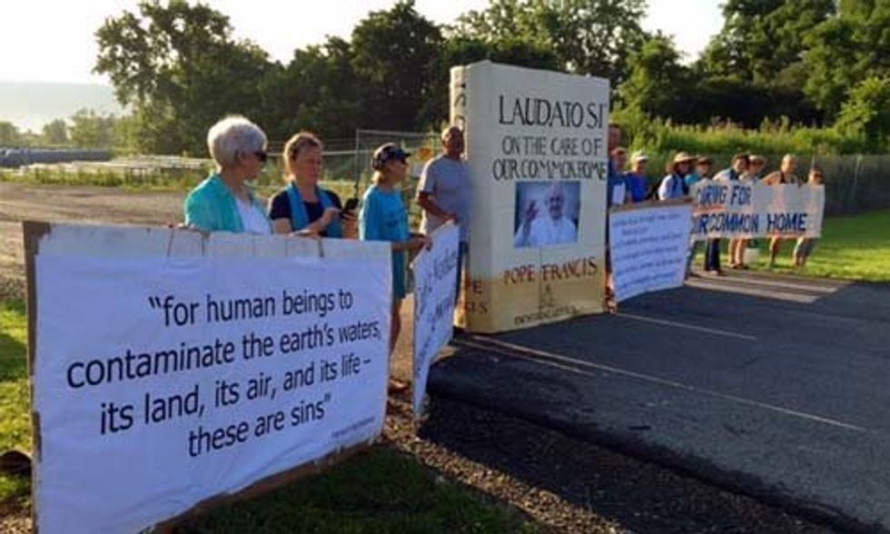 13 Arrested Blockading Crestwood Gate With Giant Replica of Pope Francis' Encyclical