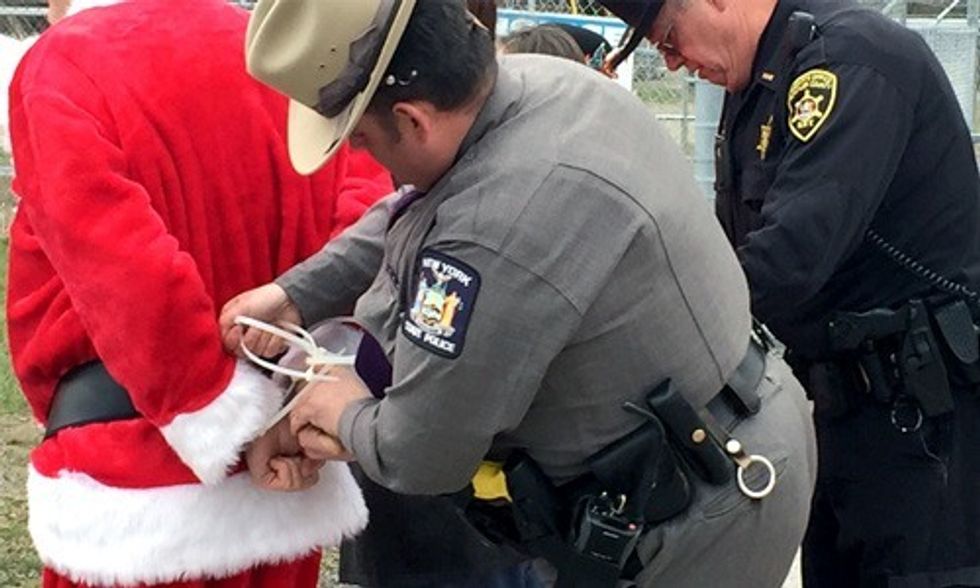 Santa Arrested at Gates of Crestwood Saying No to Dirty Energy, Yes to Renewables