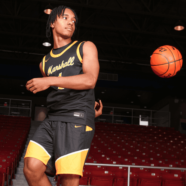 MASTERS DEGREE IN HOOPS: Marshall's Theus makes the grade