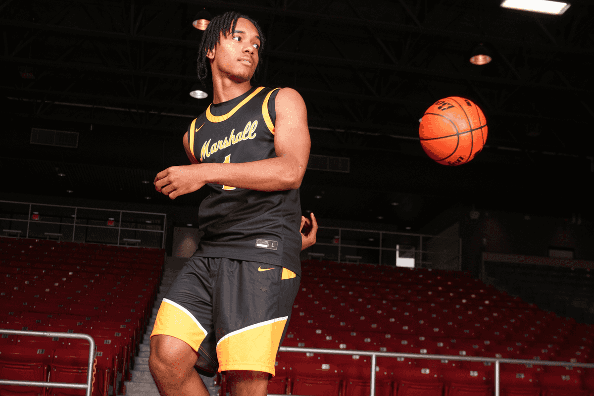 MASTERS DEGREE IN HOOPS: Marshall's Theus makes the grade