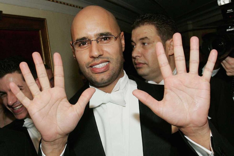 Beyonce, Usher, Mariah Carey Accused of Taking "Blood Money" from Qaddafi Family