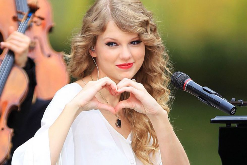 24 Photos of Celebs Making Heart Symbols With Their Hands