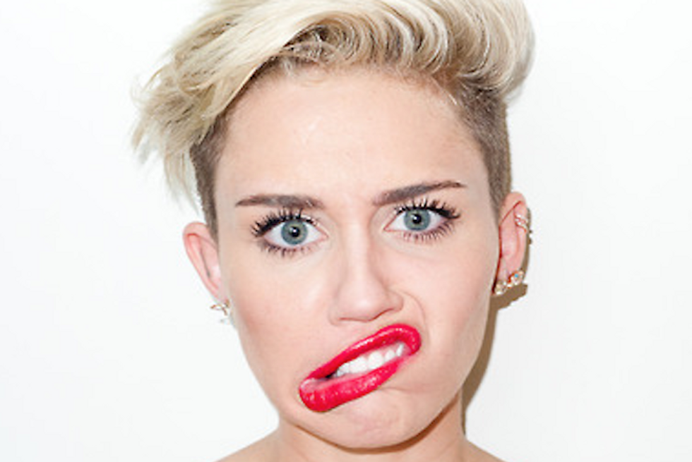 Miley Strips Down to Her Sports Bra For Terry Richardson