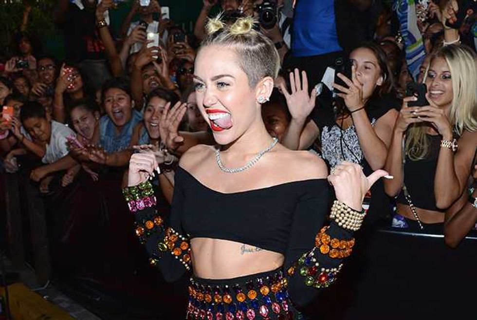 Nothing Says ‘I Love You’ Like Grandma’s Face On Your Arm—Check Out Miley’s Tattoo Tribute