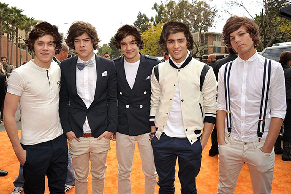 One Directon on orange carpet
